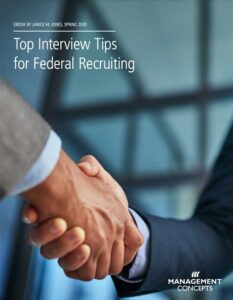 Two hands giving a tight handshake behind the title "Top Interview Tips for Federal Recruiting."